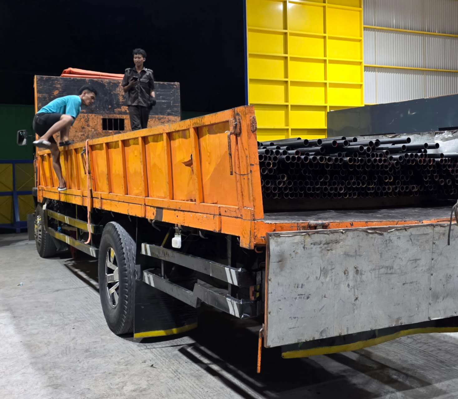 Steel pipes loaded on a delivery truck